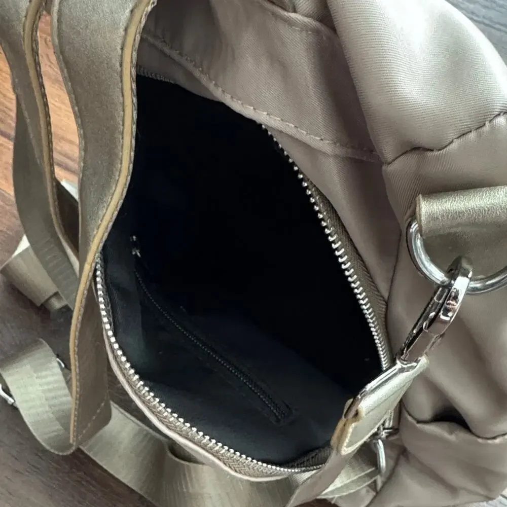 Neutral Taupe Woman’s Backpack with Metallic Accent and many zipper pockets. - Picture 6 of 13
